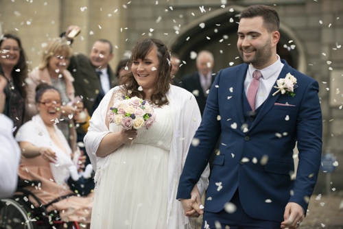 Photograph of Toby & Elizabeth Whittington after their wedding at Norwich Castle